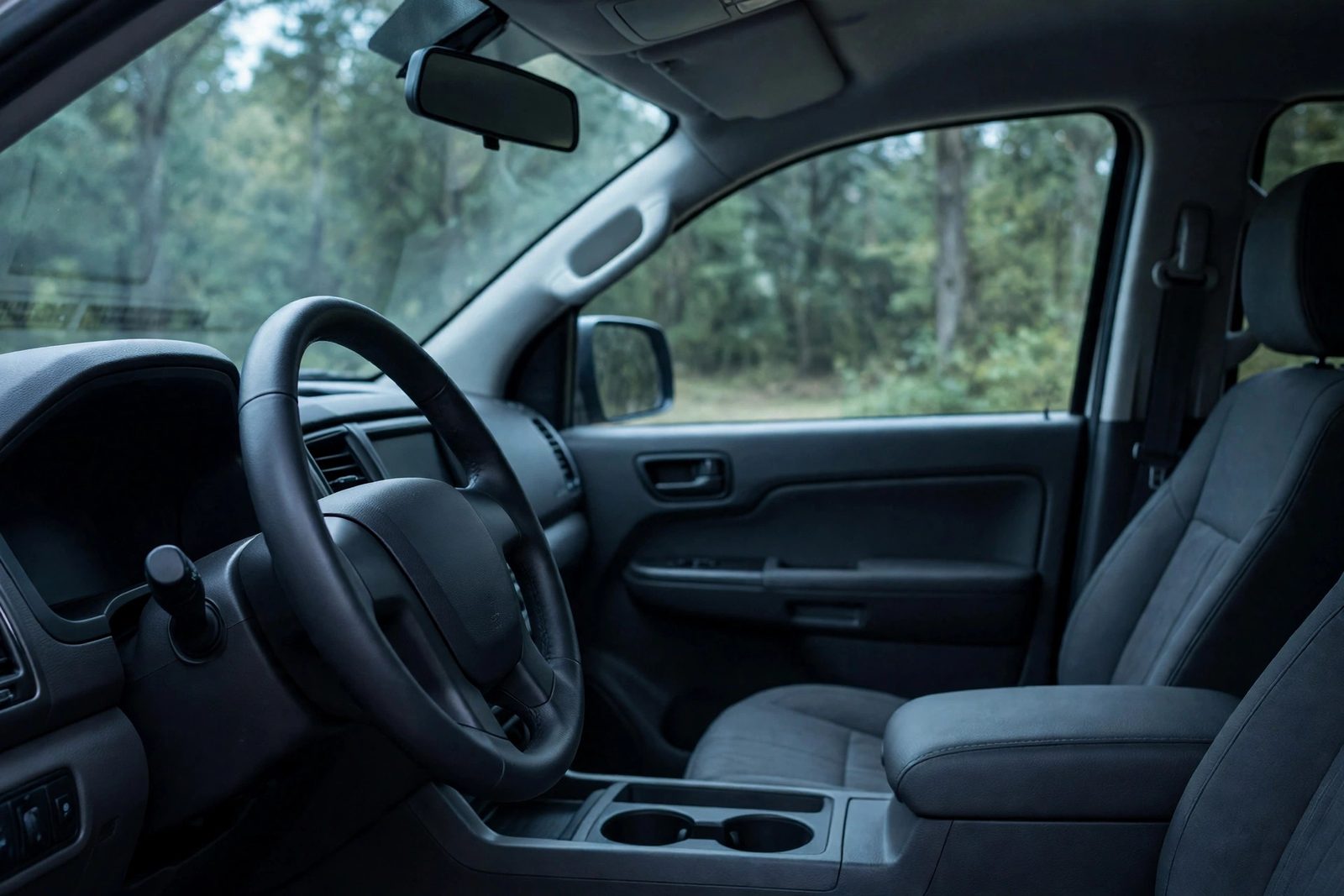 Shaded pickup truck cab interior after window tinting in Snellville